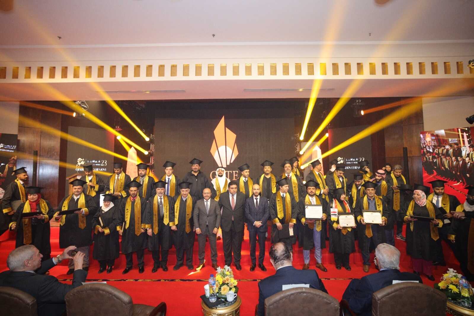  Gulf male graduates celebrating at Gate Academy graduation ceremony in Dubai. 